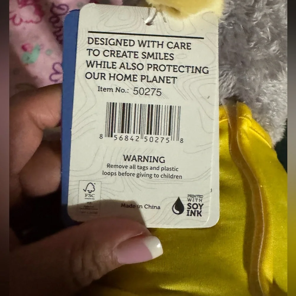 Charming Gray Elephant Toy with Yellow Accents